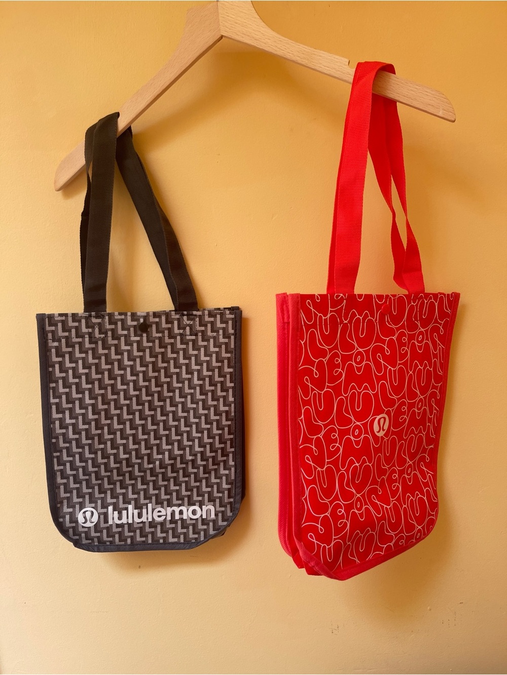 lululemon athletica Red and Black Printed Tote Bags